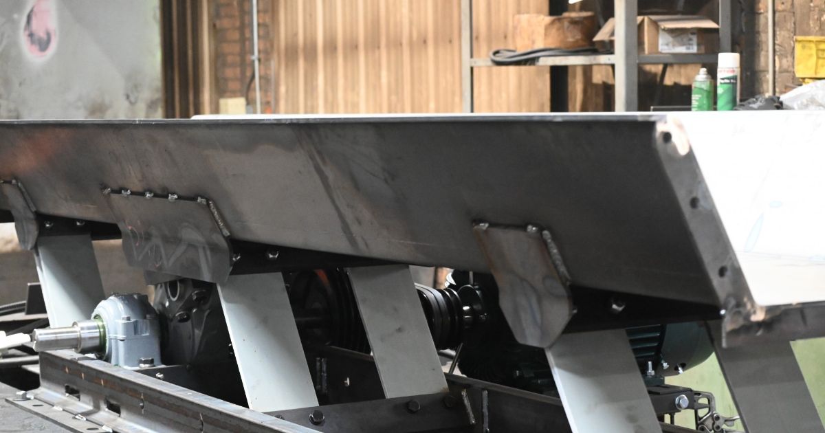 Why Use Vibratory Conveyors ster Industries, Inc